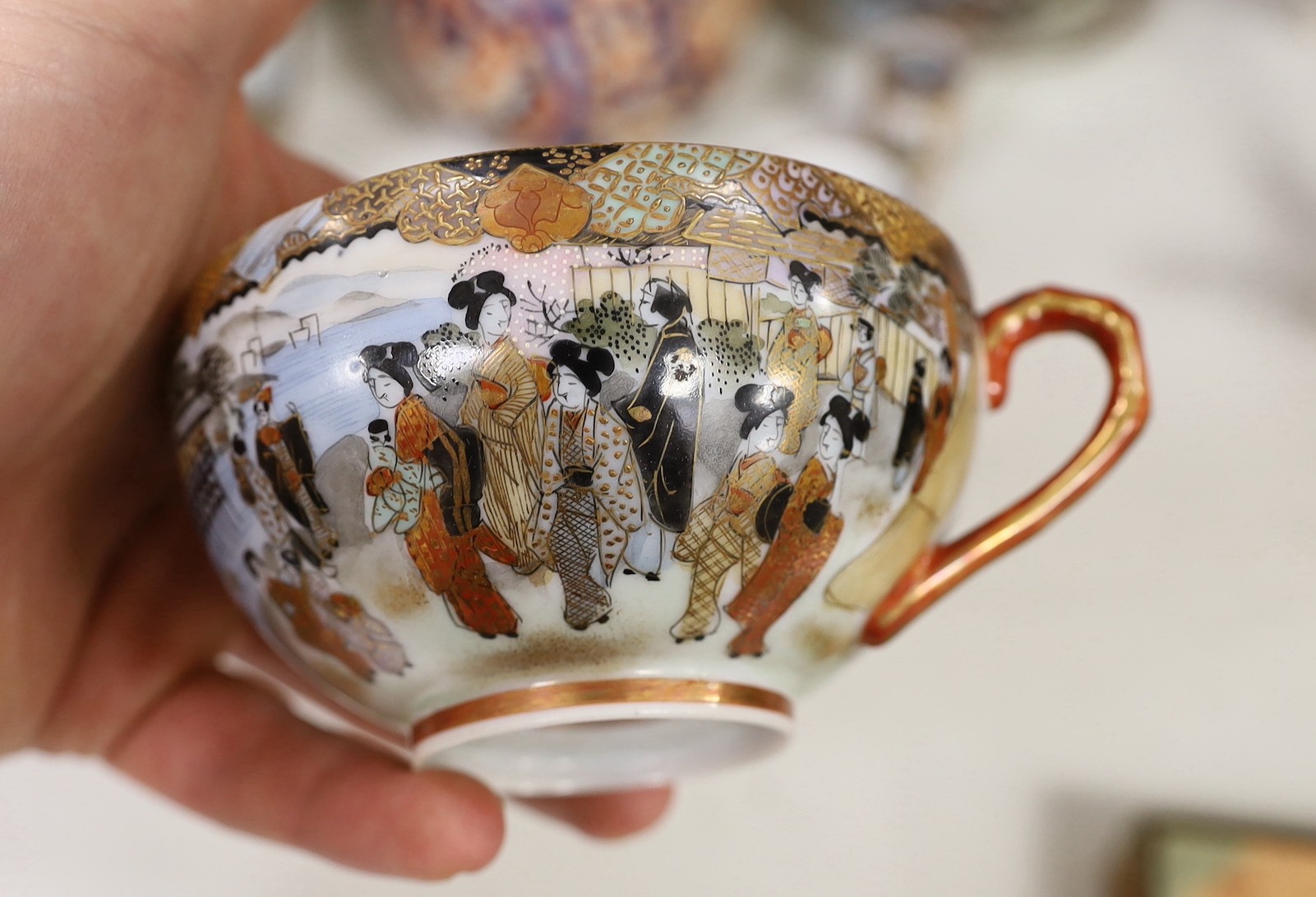 Assorted Japanese ceramics including an Imari bottle vase, a Satsuma vase and Kutani eggshell porcelain